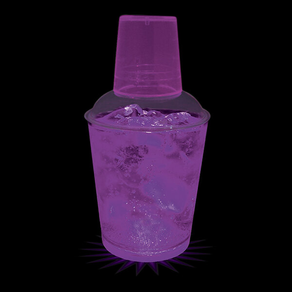 A 12 oz. purple plastic shaker with a purple drink and ice.