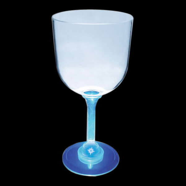 A clear wine glass with a blue stem and a blue LED light inside.