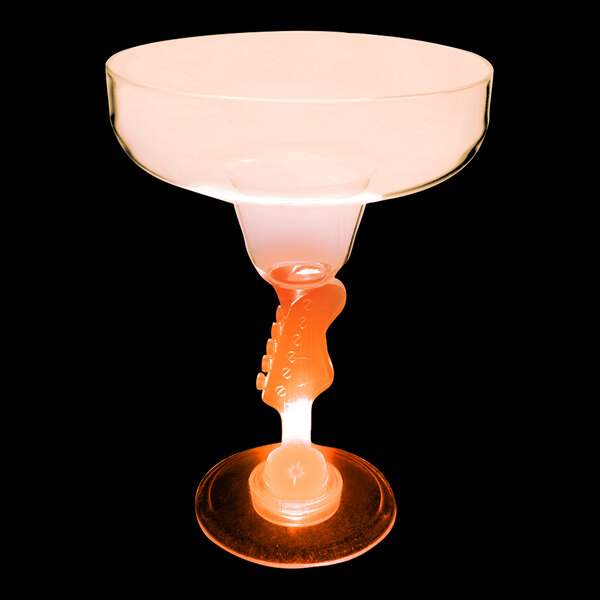 A 12 oz plastic margarita glass with a guitar stem and an orange LED light.