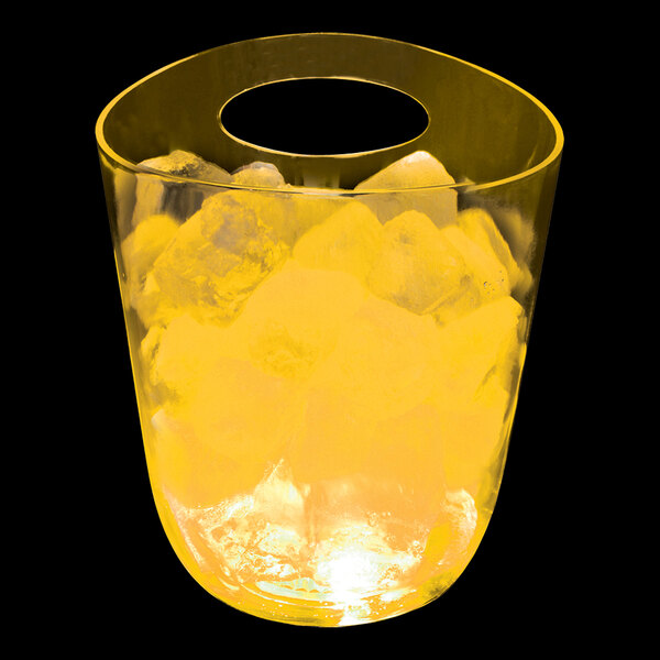 A yellow plastic champagne bucket with ice inside.