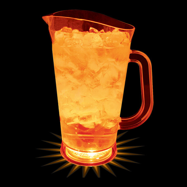 A customizable plastic pitcher filled with ice and orange liquid.