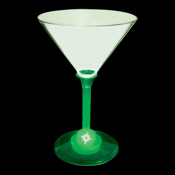 A white triangular 7 oz. plastic martini glass with a green stem and light.