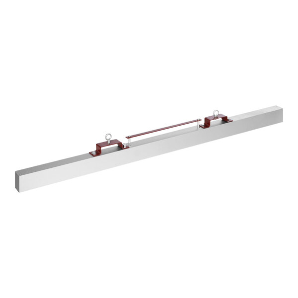 A long rectangular steel object with red handles.