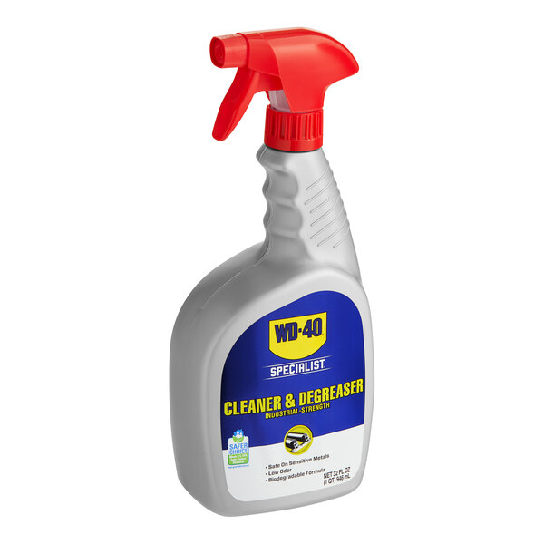A close-up of a WD-40 Industrial-Strength Cleaner and Degreaser spray bottle with a red and blue label.