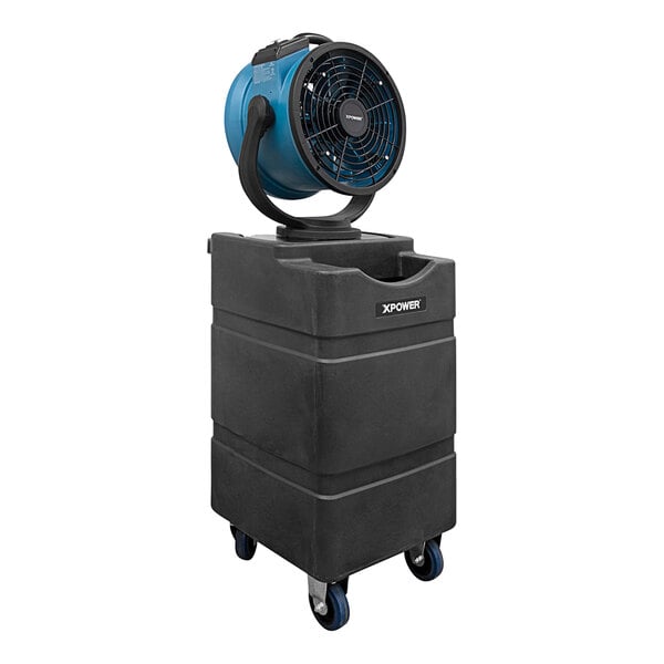 An XPOWER black and blue portable fan with a black plastic container on wheels.