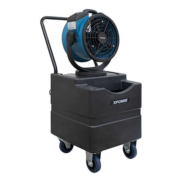 A blue and black XPOWER Portable Misting Fan on a black container.