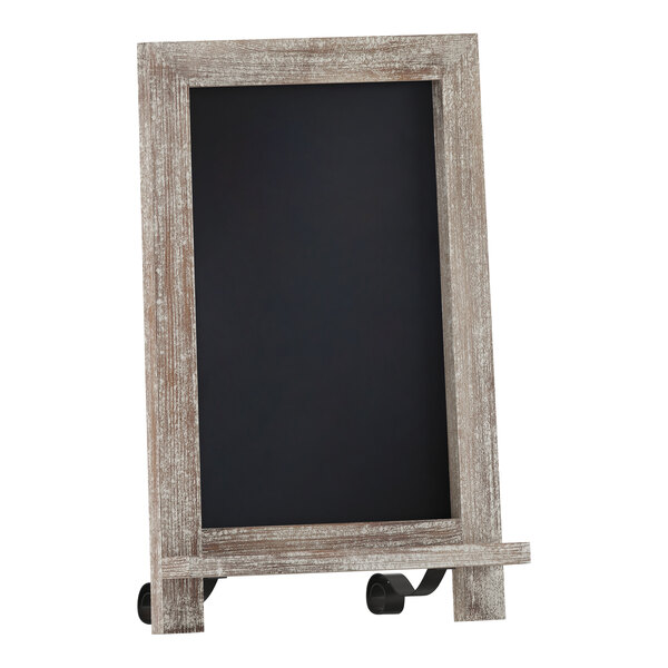 A Flash Furniture Canterbury tabletop chalkboard with metal scrolled legs.