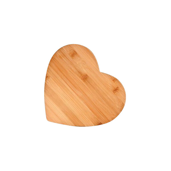 A Franmara heart-shaped bamboo cutting board on a table.