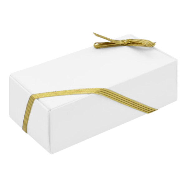 A white box with a gold ribbon.