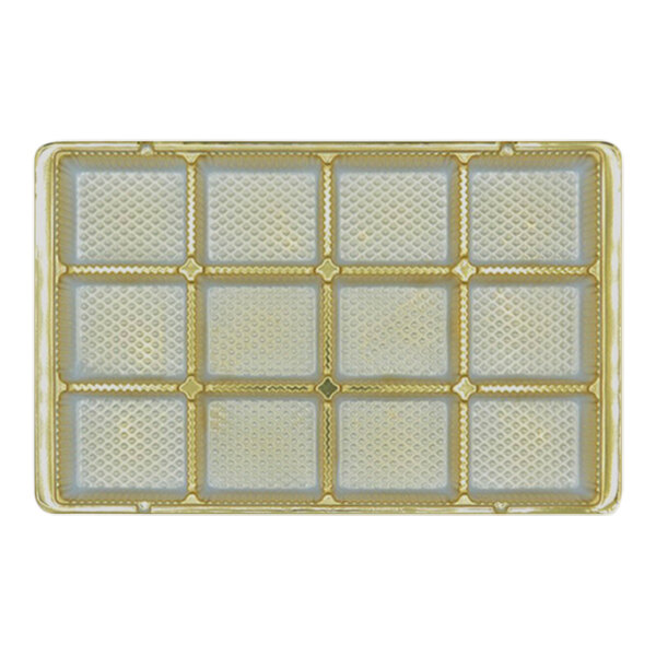 A white and gold square candy tray with 12 cavities.