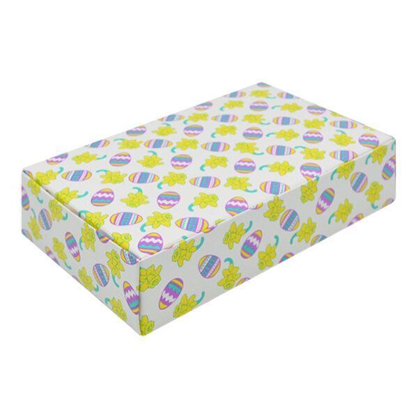 A white 1-piece candy box with colorful Easter egg and daffodil designs.