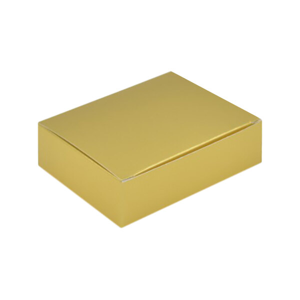 A yellow 1/4 lb. gold foil candy box with a white lid.
