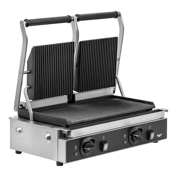 A Vollrath double commercial panini grill with grooved plates on a table.