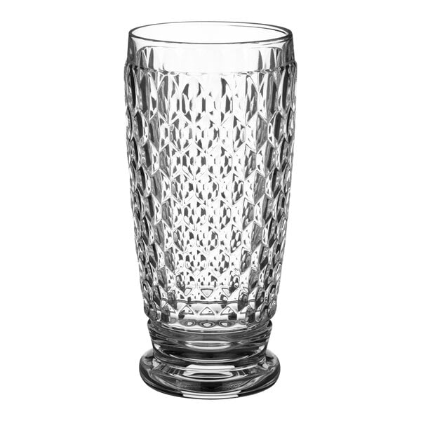 A close-up of a clear Villeroy & Boch highball glass with a diamond pattern.