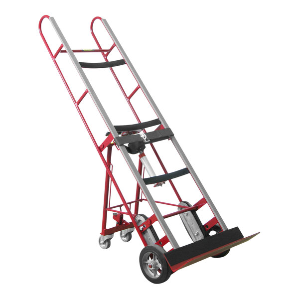 A red and silver Wesco Industrial Products steel appliance hand truck with wheels and a handle.