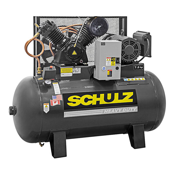 A large black and silver Schulz of America horizontal air compressor tank with yellow and black text.