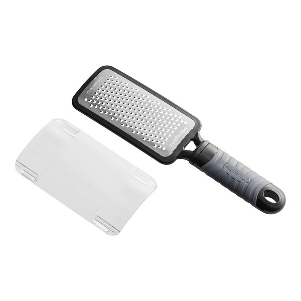 A close-up of a black Microplane coarse grater with a plastic cover.