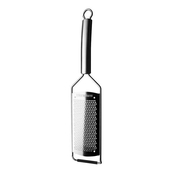 A Microplane stainless steel paddle-style grater with a metal handle.