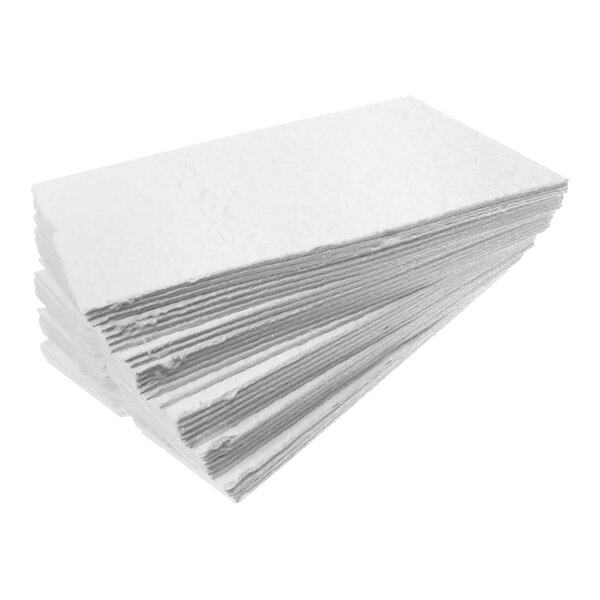 A stack of white Henny Penny filter pads.