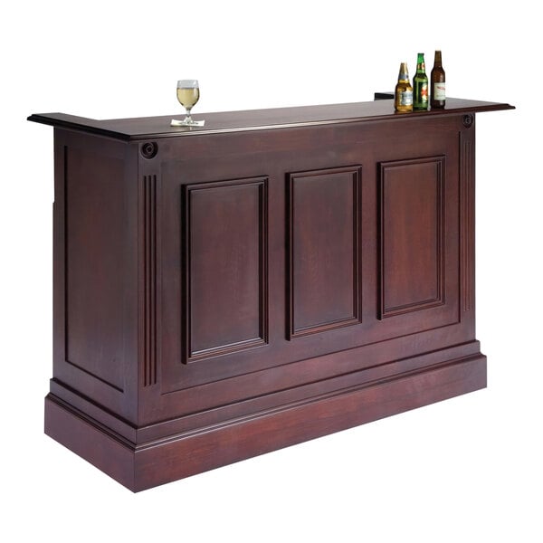 A Lakeside portable bar with a red mahogany finish and stainless steel interior, with bottles and glasses on top.