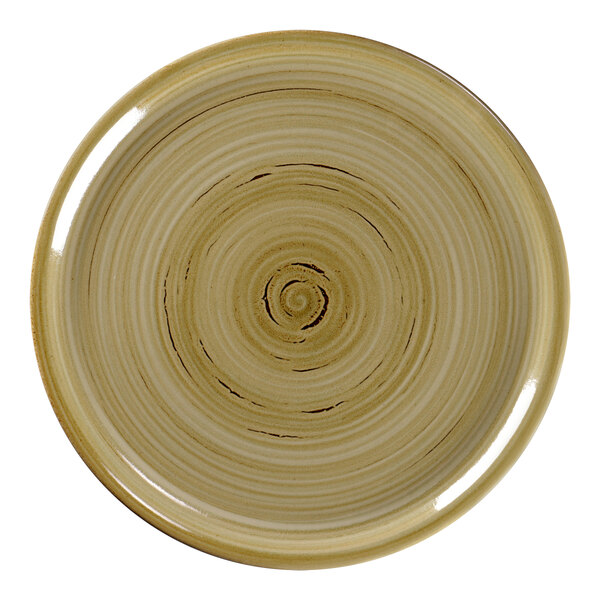A close-up of a brown RAK Porcelain pizza plate with a white spiral design.