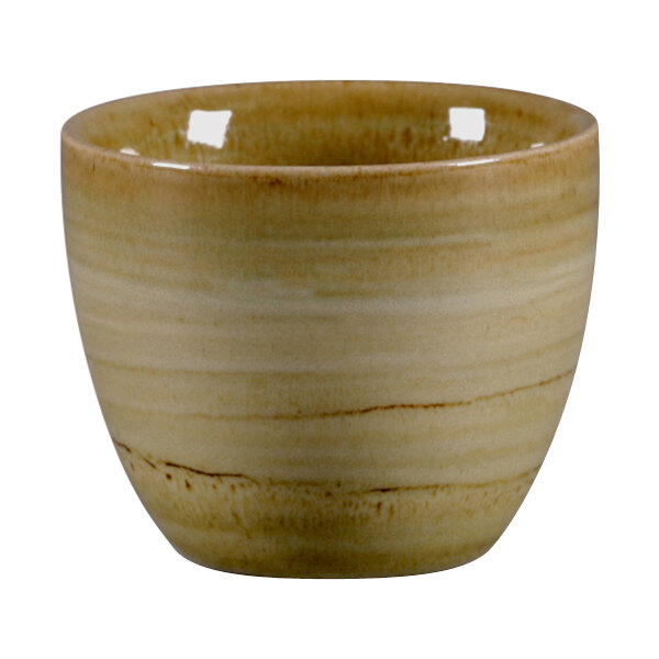 A garnet porcelain RAK cup with a brown surface.