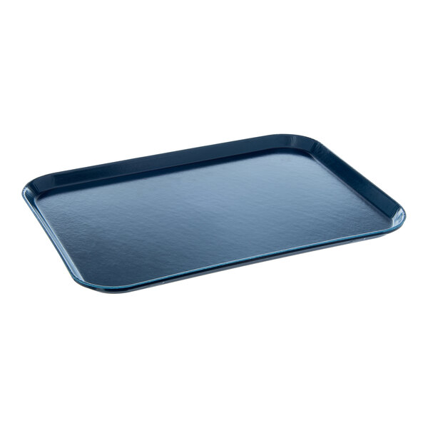 A blue rectangular Dinex fiberglass tray with a dark surface and a blue rim.