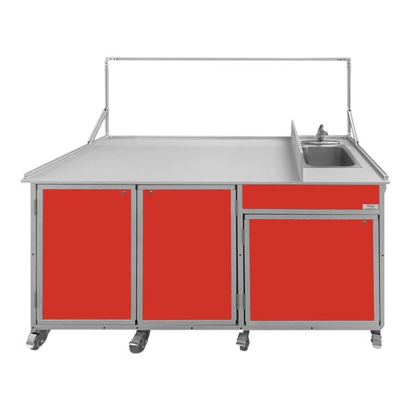 A red food service cart with a portable sink.