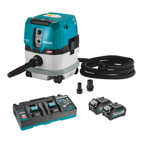 A Makita cordless vacuum with black and blue batteries.