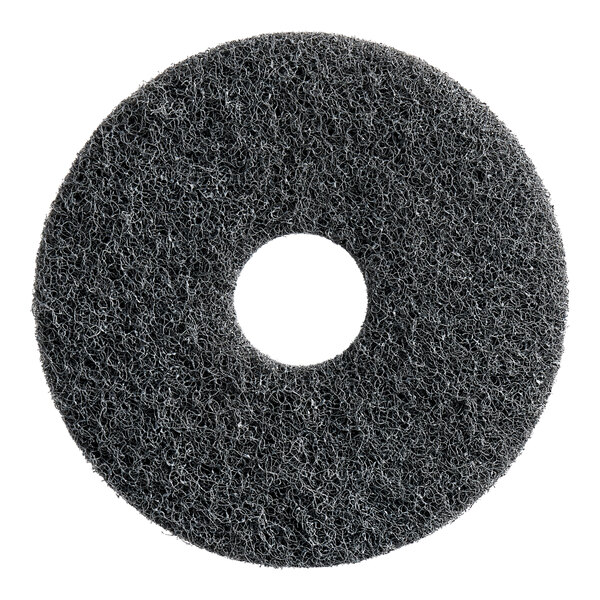 A black circular Lavex Pro floor pad with a hole in the middle.