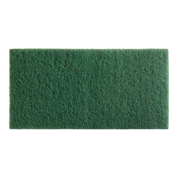 A close-up of a green Lavex scrubbing pad.
