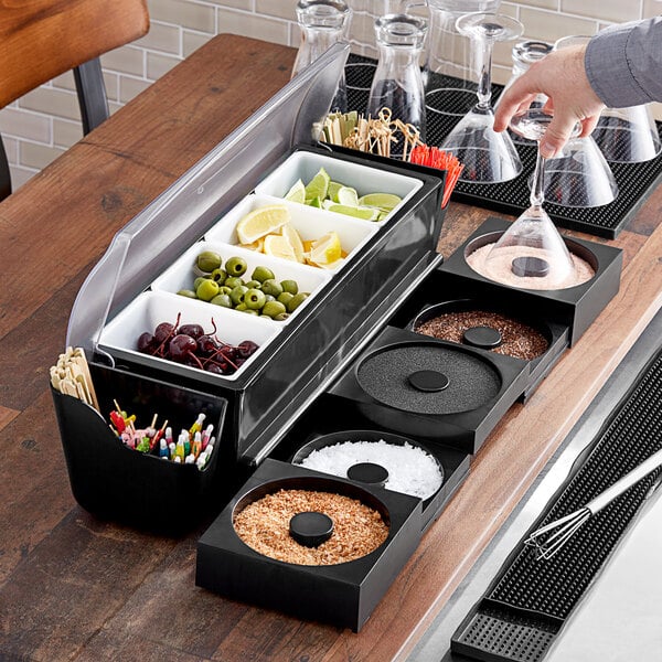 Choice 4-Compartment Black Plastic Condiment Station with 5 Rimming Trays