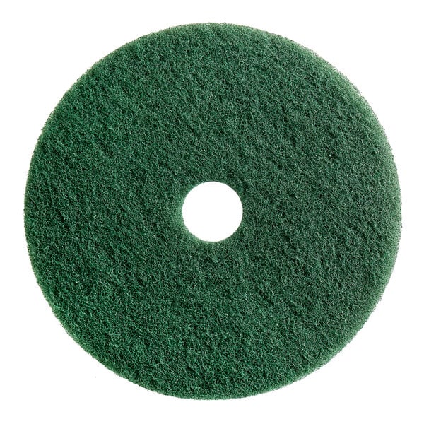 A green Lavex scrubbing pad for a floor machine.
