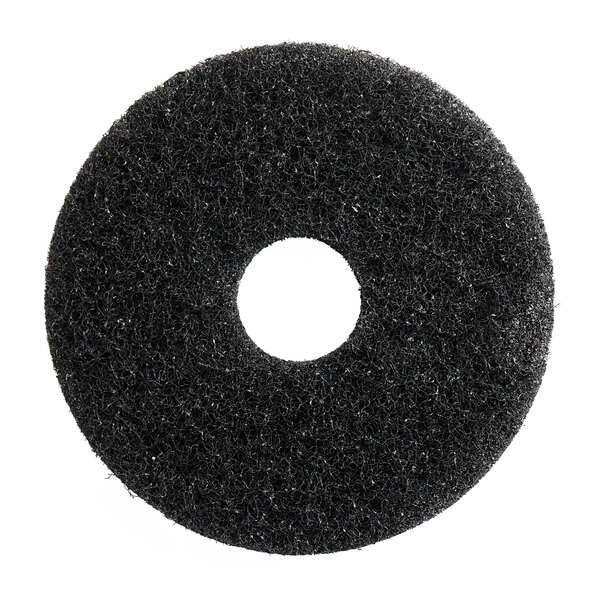 A black circular Lavex stripping floor pad with a hole in the middle.
