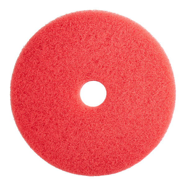A red circular Lavex buffing pad with a hole in the middle.