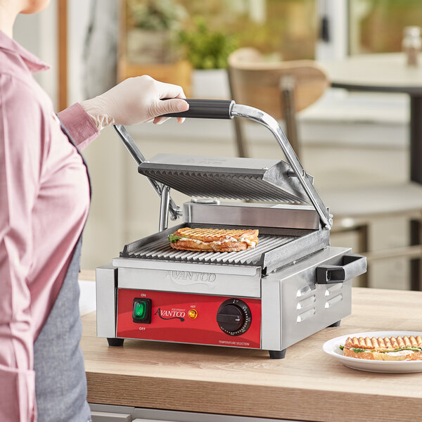 Avantco PG100 Commercial Panini Sandwich Grill with Grooved Plates and 8 1/2" x 8 1/2" Cooking Surface - 120V, 1750W