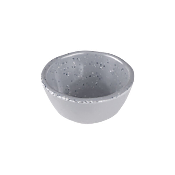 An Elite Global Solutions granite stone ramekin with speckled grey color.