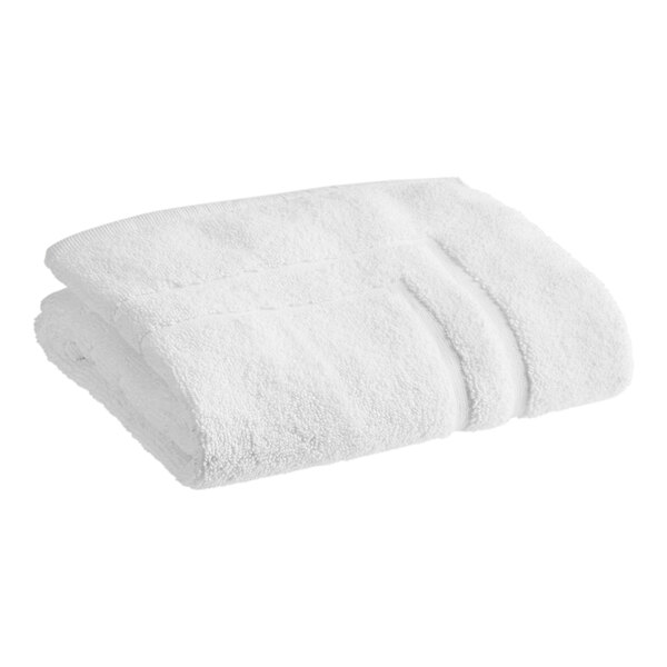 A white 1888 Mills Sweet South bath mat folded on a white background.