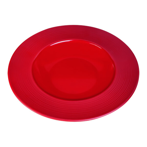 A close-up of a red Elite Global Solutions Maya melamine bowl with a rim.