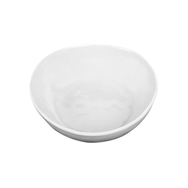 A close-up of an irregular round white Elite Global Solutions Maya melamine bowl.