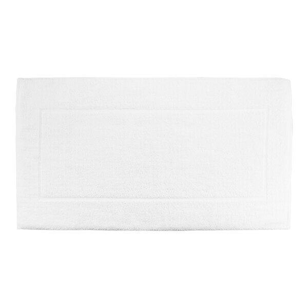A white 1888 Mills Pure Terry bath mat.