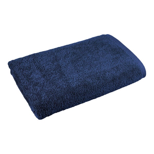 A navy blue 1888 Mills bath towel.