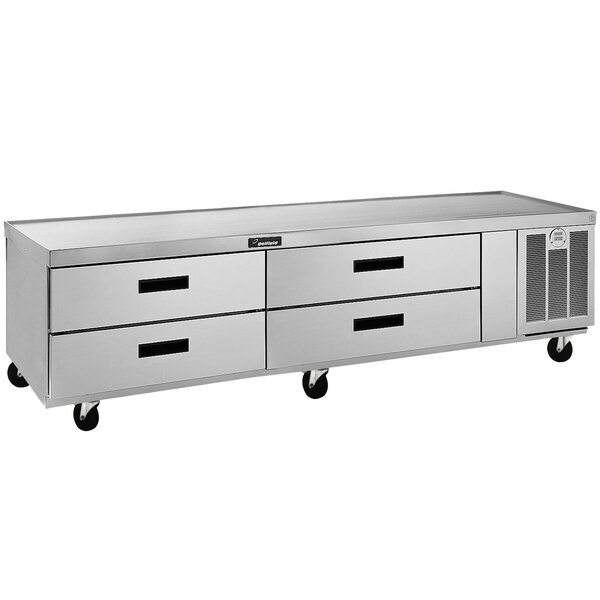 A Delfield stainless steel chef base with four drawers.