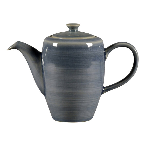 A jade RAK Porcelain teapot with a lid.