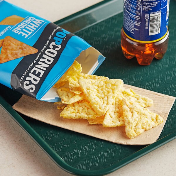 A tray with a bag of Popcorners White Cheddar chips on it.