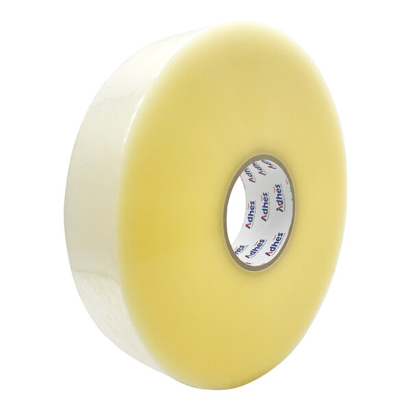 A roll of Adhes yellow machine packaging tape with clear text on a white background.