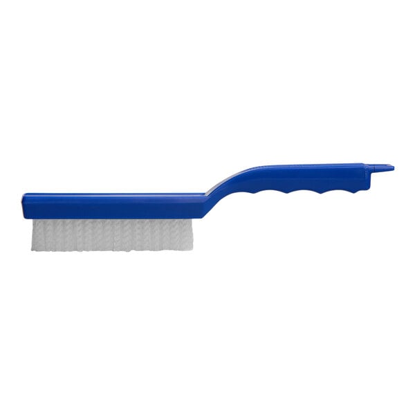 A blue Carlisle Flo-Pac utility brush with a white handle.