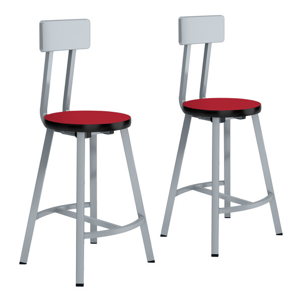 A pair of National Public Seating Titan lab stools with hollyberry high-pressure laminate seat and backrests.