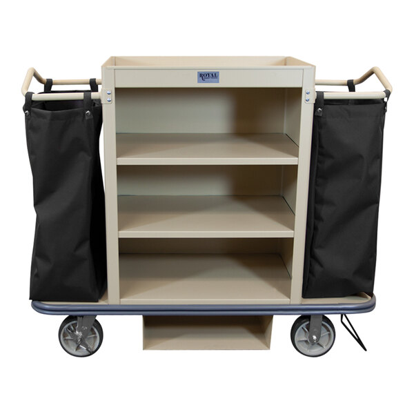 A Royal Basket Trucks beige housekeeping cart with two black bags on it.