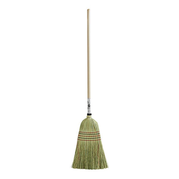 A close-up of a Heavy-Duty Authentic Amish-Made Corn Broom with a wooden handle with a green tip.